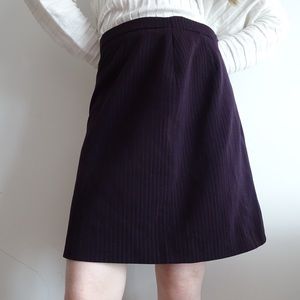 PURPLE SKIRT WITH VERTICAL STRIPES